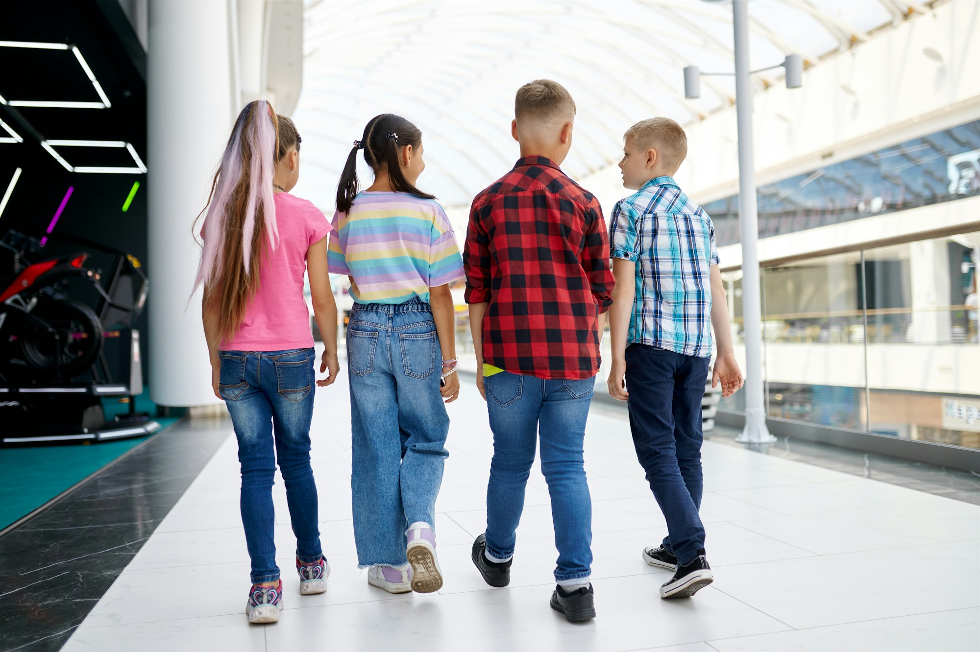 Cheerful children walking in entertainment center
